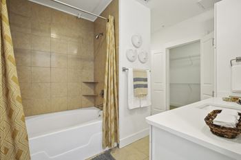 Grand garden tubs with full tile surrounds