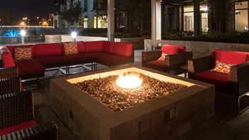 Resort-style pools with landscaping, kitchen & fire pits