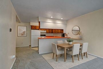 Anchorage apartment for rent - A kitchen with a dining table and chairs.