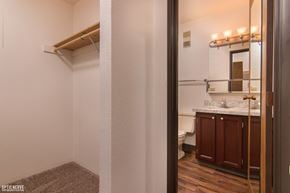 Anchorage apartment for rent - A bathroom with a towel rack and a mirror.