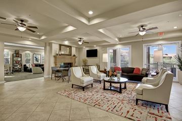 Anthem apartment for rent - A living room with a rug and a fireplace.