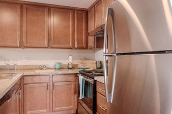 Kitchen with lots of storage, stainless steel oven, stove, refrigerator, and dishwasher