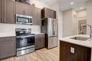 Refrigerators with bottom mount freezers