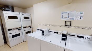 Hillside chalet apartments - laundry room