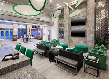 Swanky clubhouse with lounge seating and tvs