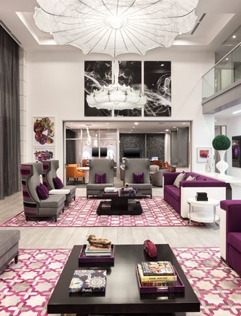 Swanky clubhouse with lounge seating and tvs