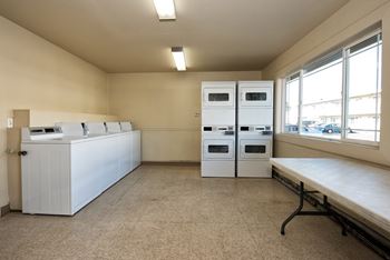 Village at calais apartments - laundry room