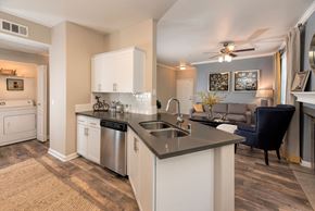 Sacramento apartment for rent - A kitchen with a sink and a stove.