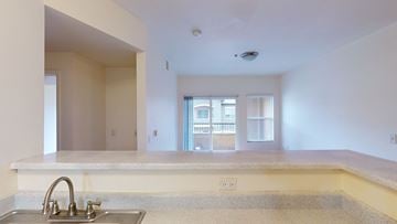 Salt Lake City apartment for rent - A kitchen with a sink and a window.