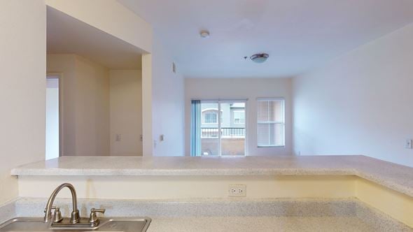 Salt Lake City apartment for rent - A kitchen with a sink and a window.