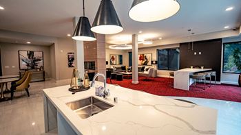 Reservable club house with catering kitchen, big screen tv and lounge
