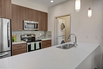 Gourmet kitchen with custom cabinetry and pantry