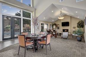 Midland apartment for rent - Our residents lounge with a carpeted floor and a window with blinds.