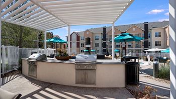 Outdoor kitchen and grilling stations
