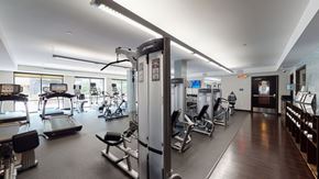 Minneapolis apartment for rent - A gym with treadmills, exercise bikes, and other equipment.