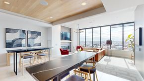 Minneapolis apartment for rent - A modern dining room with a long table and chairs.