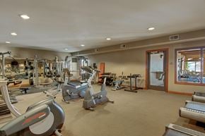 St. Cloud apartment for rent - A gym with a variety of exercise equipment.