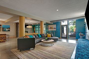 Minneapolis apartment for rent - A living room with a grey sofa and a coffee table.