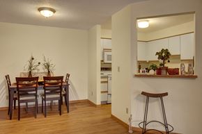 Eagan apartment for rent - A kitchen with a dining table and chairs.