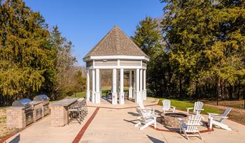 Cozy fire pit w/ adirondack seating