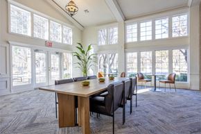 Oklahoma City apartment for rent - A conference room with a long table and chairs.