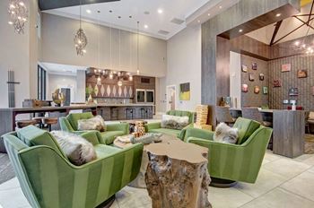 Resident lounge with 13-foot television and nfl sunday ticket