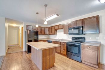 Kitchen island in select apartments