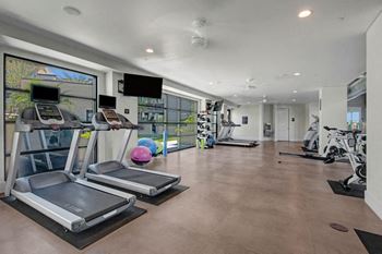 The heath club: state-of-the-art fitness facility with an outdoor yoga lawn