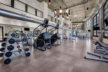 The heath club: state-of-the-art fitness facility with an outdoor yoga lawn