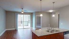 Garland apartment for rent - A kitchen with a sink and a counter top.