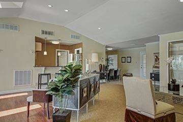 Midland apartment for rent - A living room with a brown chair and a plant.