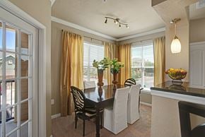 Midland apartment for rent - A dining room with a table set for four.