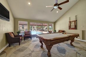 Midland apartment for rent - A room with a pool table and a television.