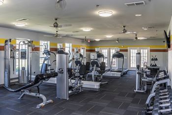 24-Hour fitness center with yoga room