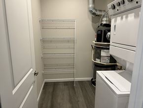 Leavenworth apartment for rent - A small kitchen with a white oven and a white dishwasher.