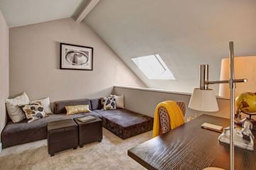 Federal Way apartment for rent - A living room with a brown couch and a brown coffee table.