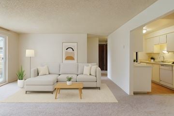 Mountlake Terrace apartment for rent - A living room with a white couch and a coffee table.