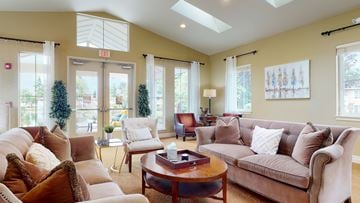 Mountlake Terrace apartment for rent - A living room with a brown couch and a coffee table.