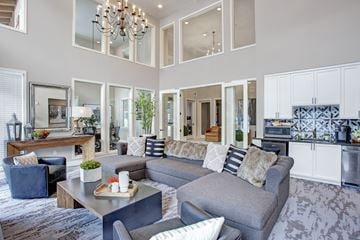 Leavenworth apartment for rent - A modern living room with a grey sofa and a wooden coffee table.