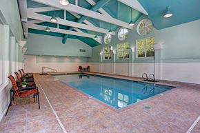 Everett apartment for rent - A large indoor swimming pool with a glass bottom.