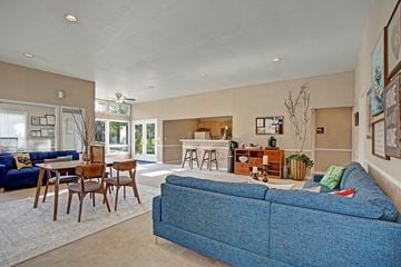 Federal Way apartment for rent - A blue couch is in the middle of a living room.