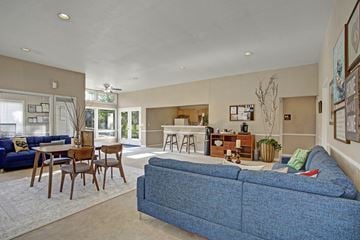Federal Way apartment for rent - A blue couch is in the middle of a living room.
