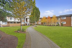 Lynnwood apartment for rent - A residential area with apartment buildings and a sidewalk.