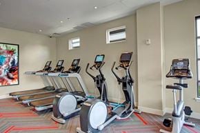 Woodinville apartment for rent - A gym with treadmills and exercise bikes.