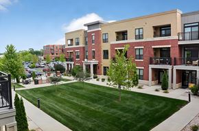 Madison apartment for rent - A large grassy area in front of apartment buildings.