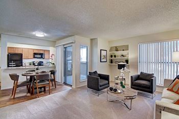 A living room with a large sliding glass door