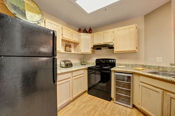 Cheyenne creek kitchen with black appliances