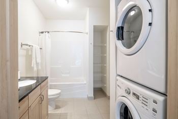 7West apartment homes bathroom with in-unit washer and dryer