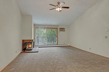Plymouth square living room with fireplace