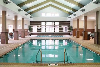 Resident pool with lounging and seating areas